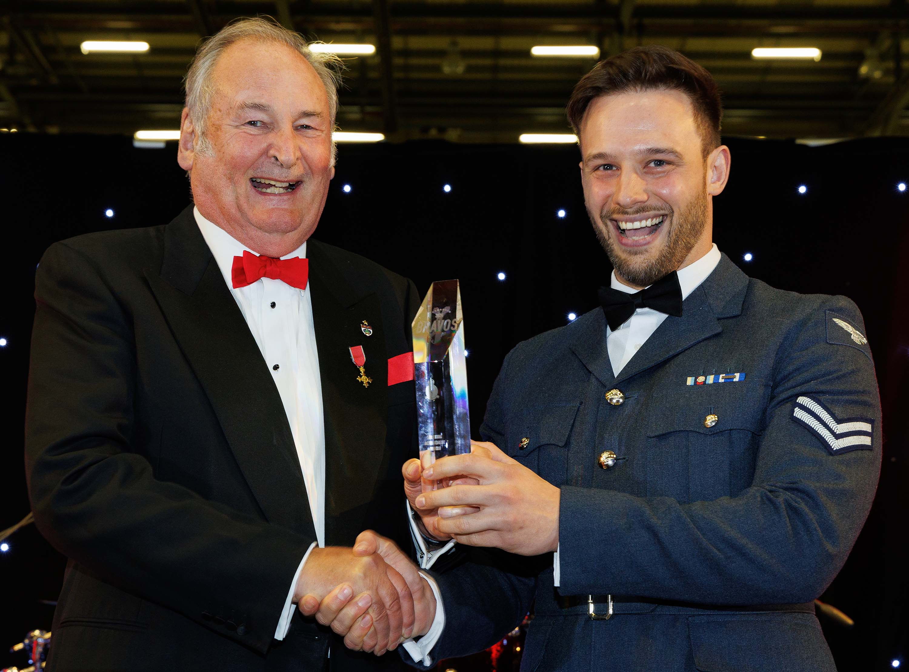 Photo: Image shows Corporal Cutler receiving the Sporting Achievement Award